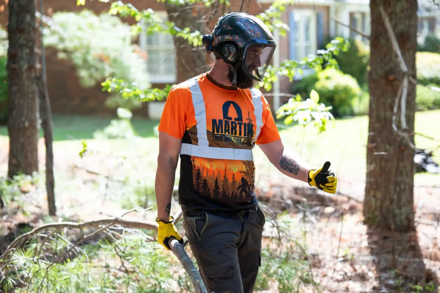 Martin Tree and Turf Care crew clearing limbs on a job across Upstate South Carolina