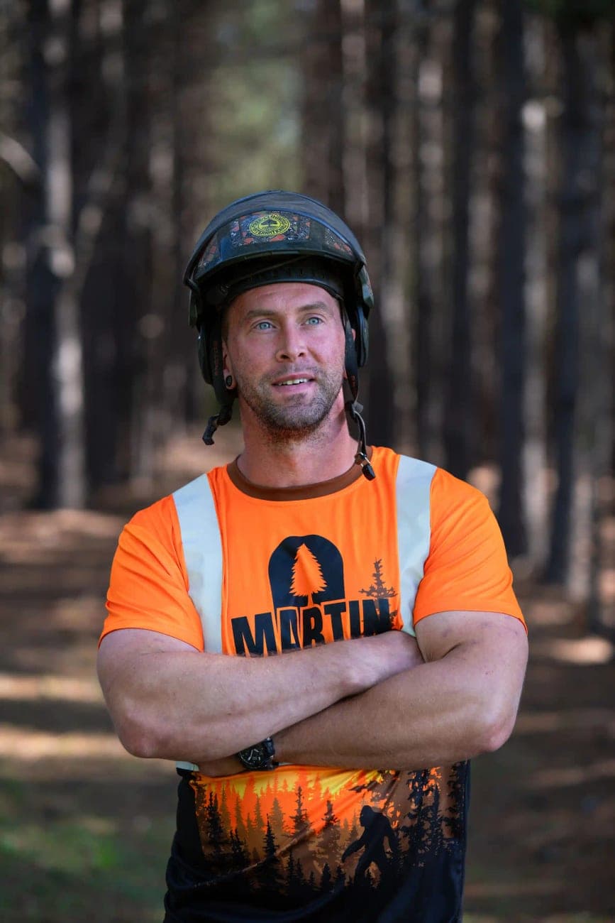 Our ISA-certified arborist selecting a native tree species for planting at a property in Upstate South Carolina